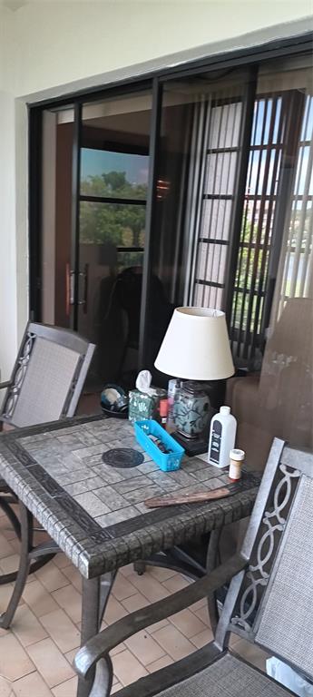 10145 Sunrise Lakes Boulevard, Unit 405 Sunrise, FL 33322 - Photo 35 of 48 a living room with furniture and a window