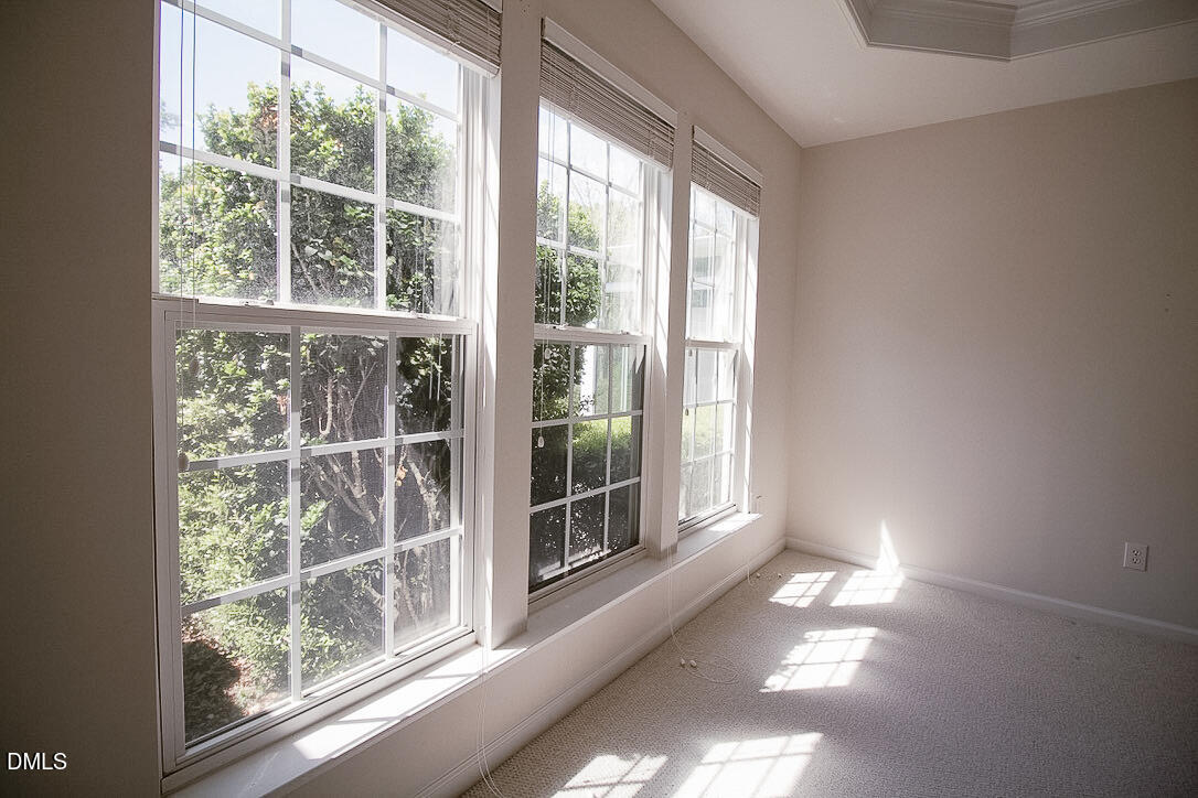 5335 Brandy Bay Road Raleigh, NC 27613 - Photo 12 of 29 a view of empty room with windows