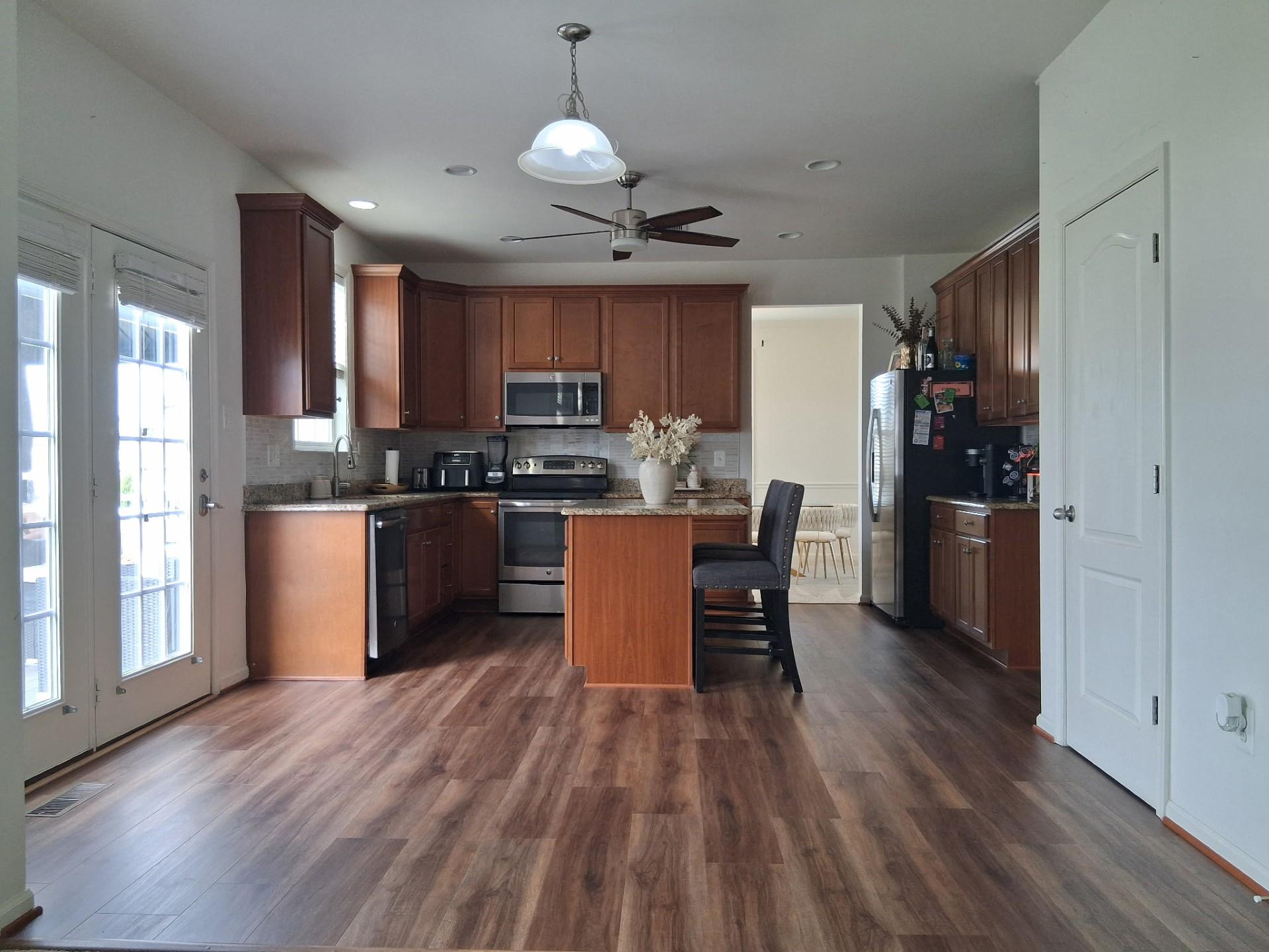 13944 Seneca Ridge Drive Hagerstown, MD 21740 - Photo 6 of 41 Kitchen with brand new LVP flooring throughout.