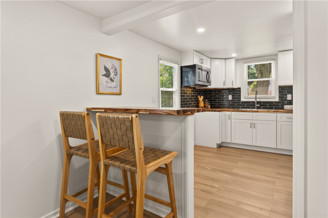 355 Falstaff Road Irondequoit, NY 14609 - Photo 9 of 27 Brand new kitchen with convenient breakfast bar!