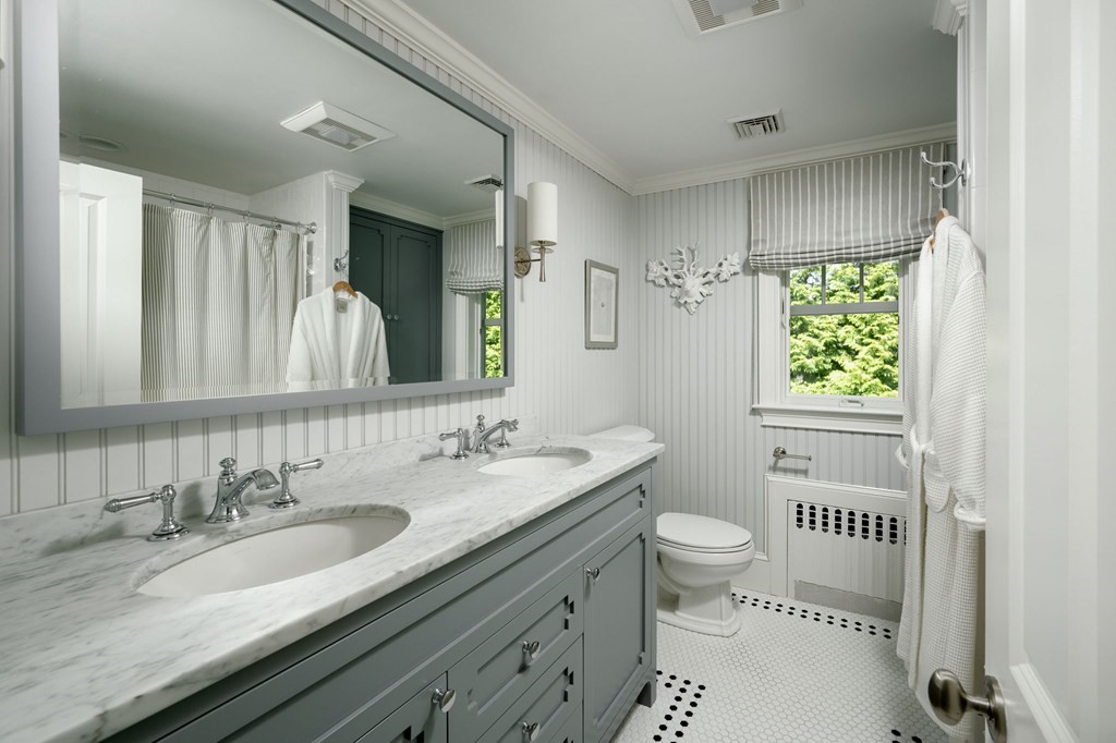 10 Elm Street Hingham, MA 02043 - Photo 13 of 19 a bathroom with a granite countertop sink mirror vanity and toilet