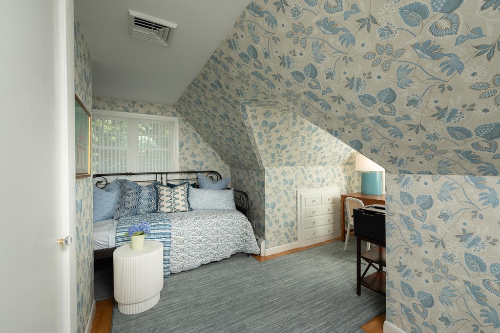 10 Elm Street Hingham, MA 02043 - Photo 16 of 19 a bedroom with a bed and a table