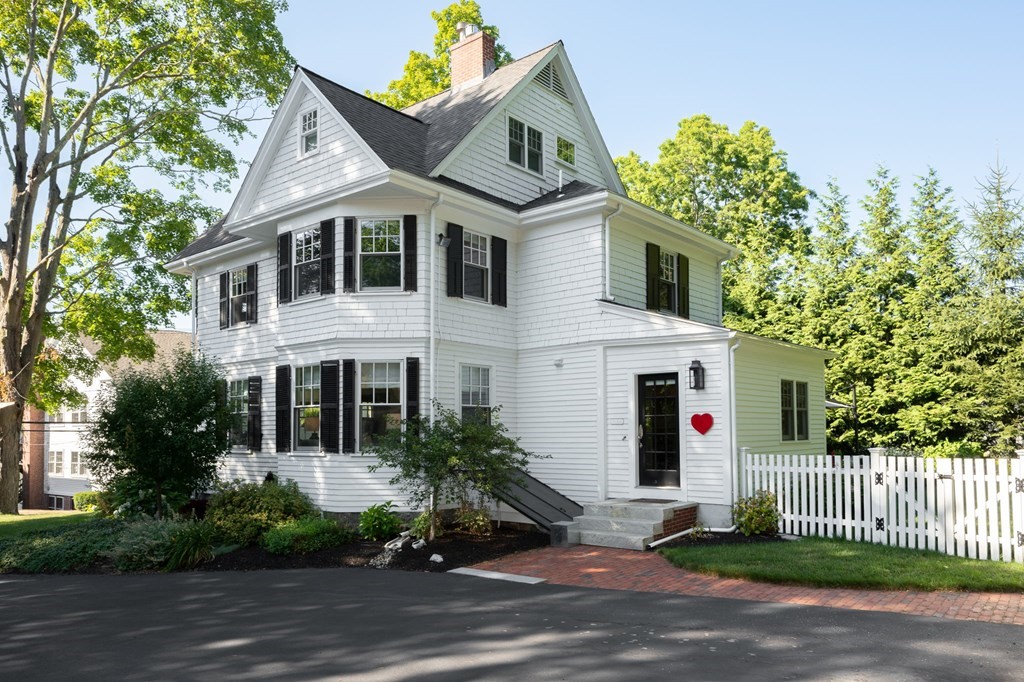 10 Elm Street Hingham, MA 02043 - Photo 17 of 19 a front view of a house with a garden