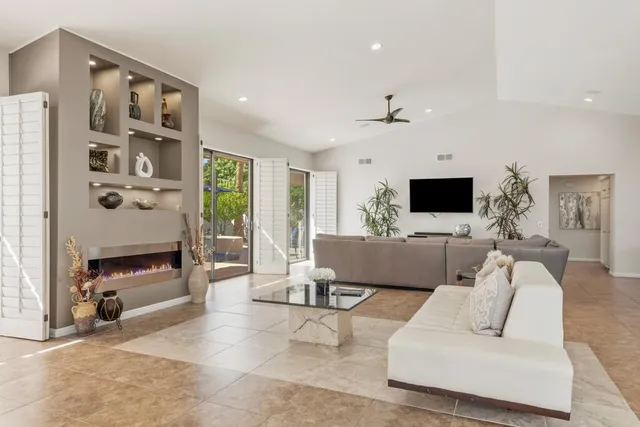 a view of a yard with basketball court