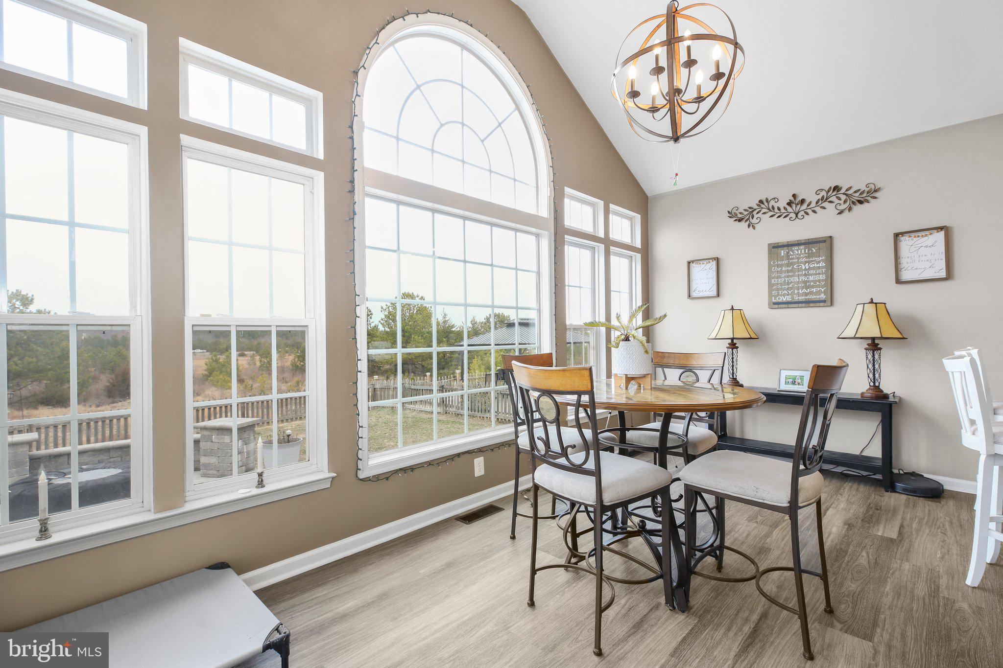 5233 Windbreak Drive Fredericksburg, VA 22407 - Photo 13 of 53 a view of a dining room with furniture window and wooden floor