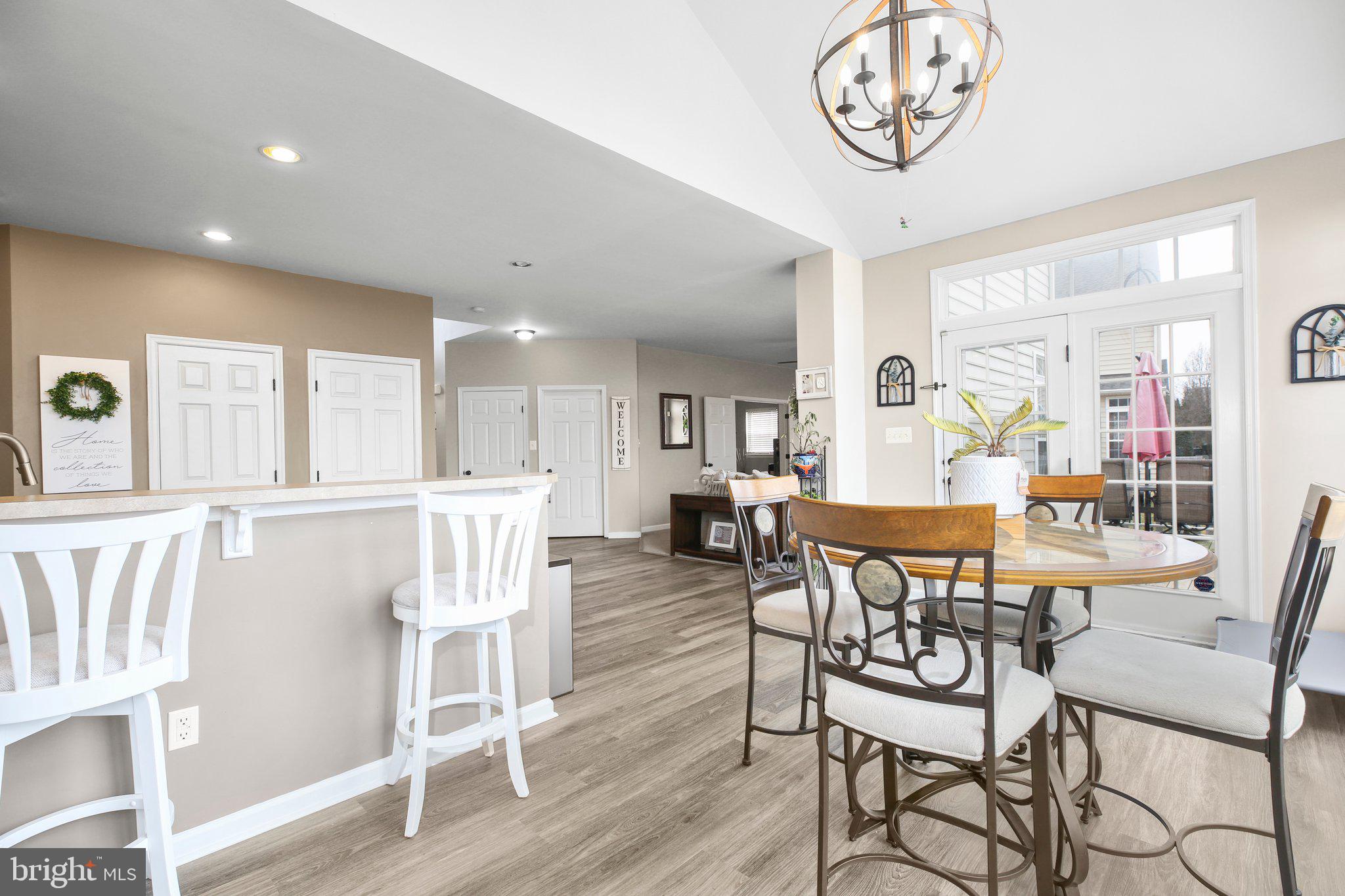 5233 Windbreak Drive Fredericksburg, VA 22407 - Photo 14 of 53 a view of a dining room with furniture window and wooden floor