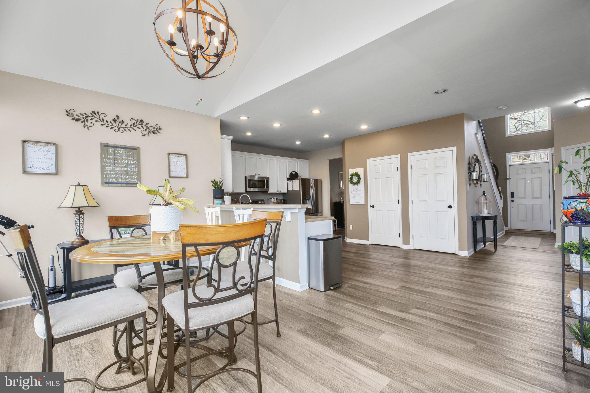 5233 Windbreak Drive Fredericksburg, VA 22407 - Photo 15 of 53 a view of a dining room with furniture and wooden floor