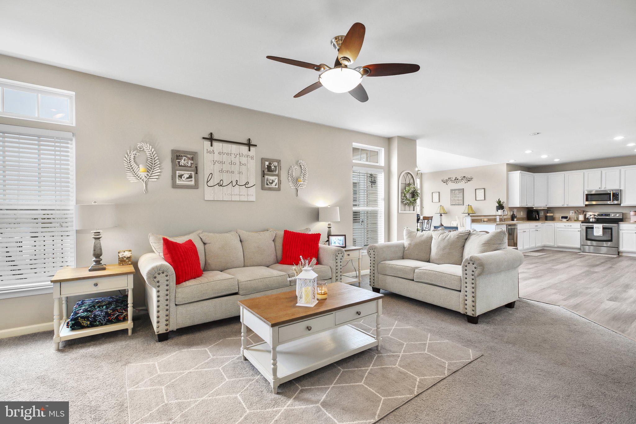 5233 Windbreak Drive Fredericksburg, VA 22407 - Photo 19 of 53 a living room with furniture and kitchen view