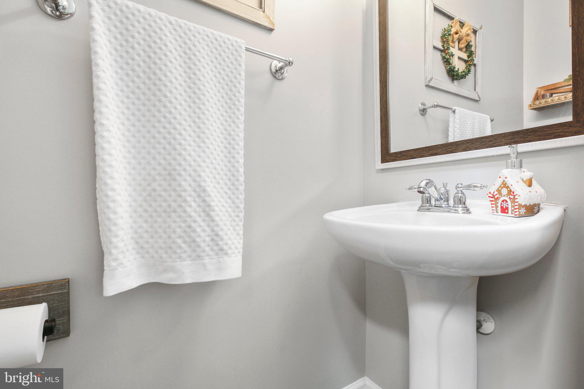 5233 Windbreak Drive Fredericksburg, VA 22407 - Photo 23 of 53 a bathroom with a sink and a mirror