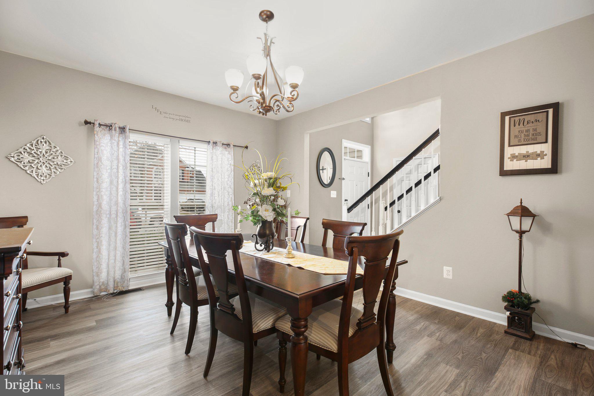 5233 Windbreak Drive Fredericksburg, VA 22407 - Photo 25 of 53 a view of a dining room with furniture wooden floor and chandelier