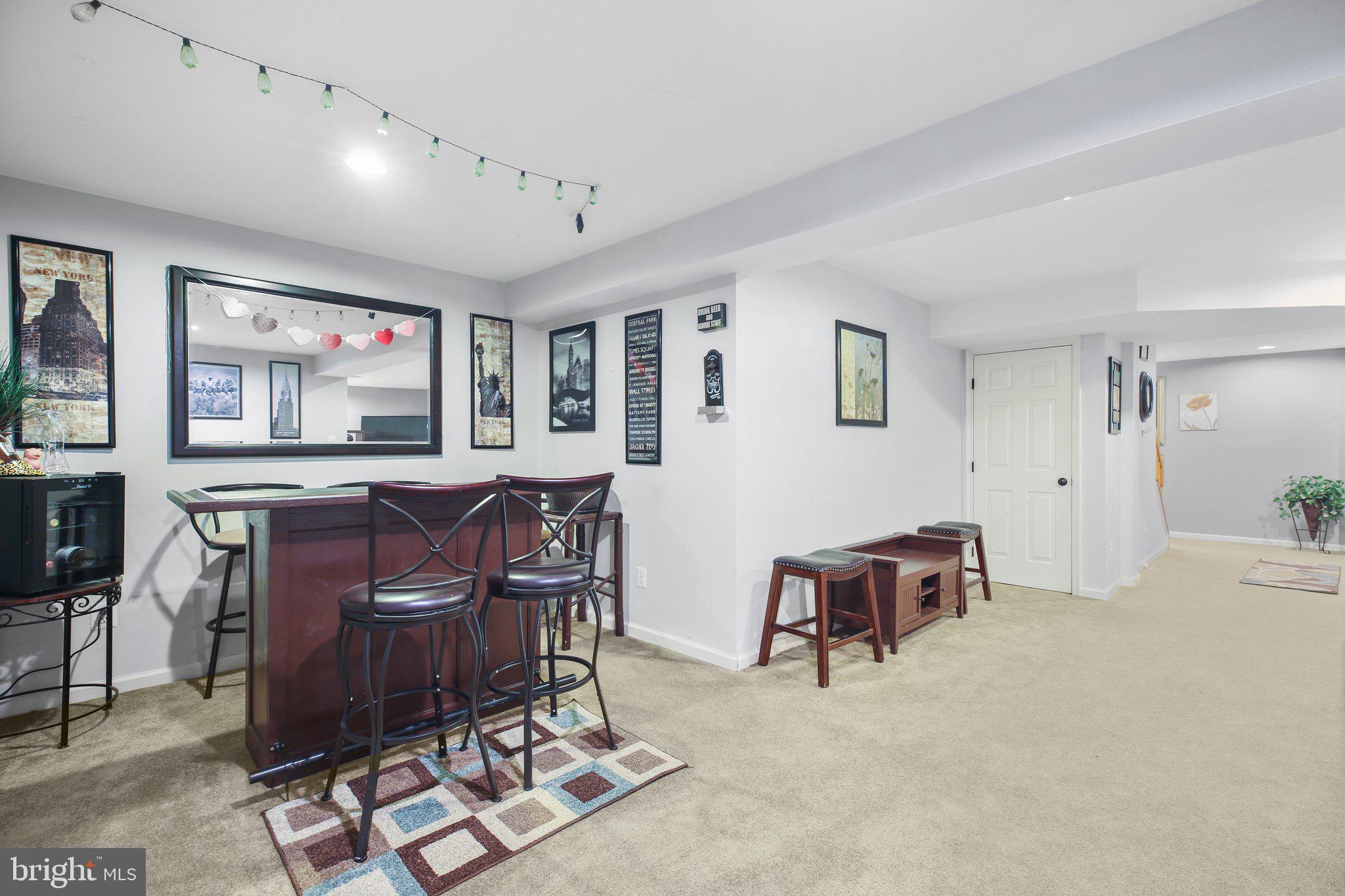 5233 Windbreak Drive Fredericksburg, VA 22407 - Photo 41 of 53 a living room with furniture a computer on desk and chair