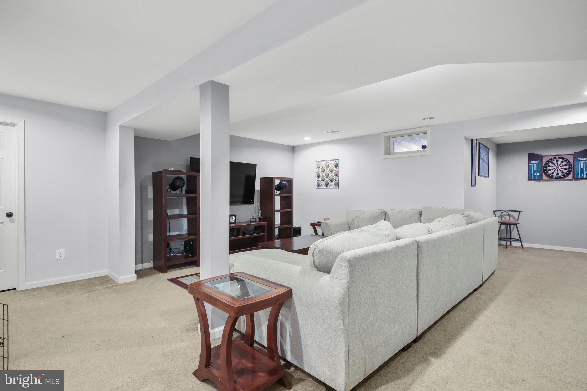 5233 Windbreak Drive Fredericksburg, VA 22407 - Photo 45 of 53 a living room with furniture
