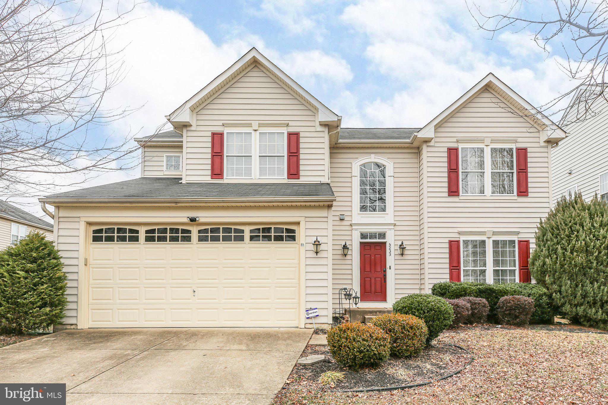 5233 Windbreak Drive Fredericksburg, VA 22407 - Photo 47 of 53 a view of a brick house with many windows