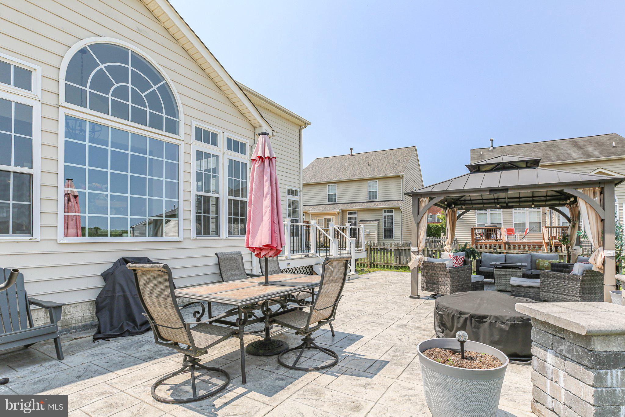 5233 Windbreak Drive Fredericksburg, VA 22407 - Photo 8 of 53 a dining room with furniture and a fireplace