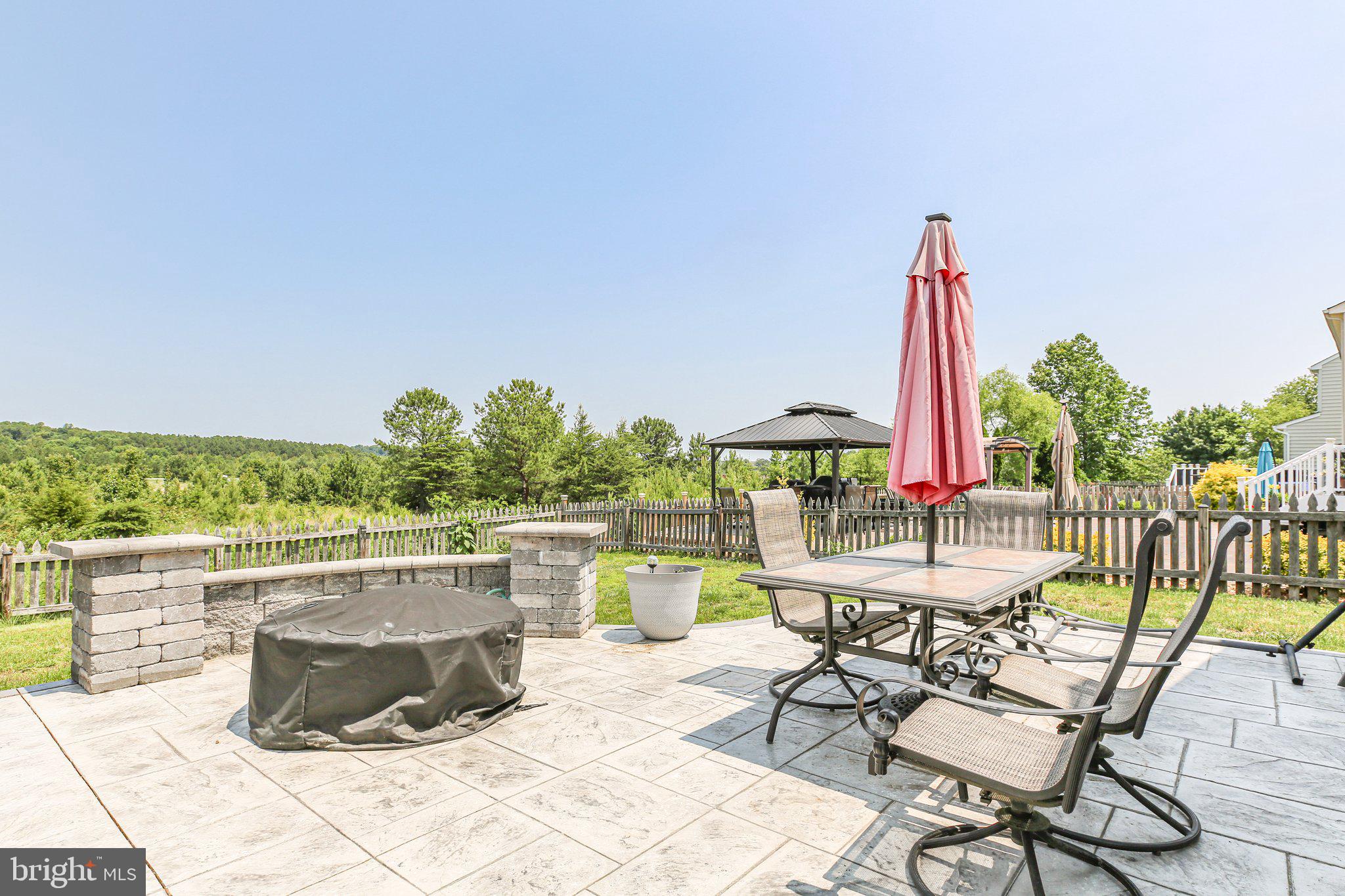 5233 Windbreak Drive Fredericksburg, VA 22407 - Photo 9 of 53 a view of a swimming pool with outdoor seating and city view
