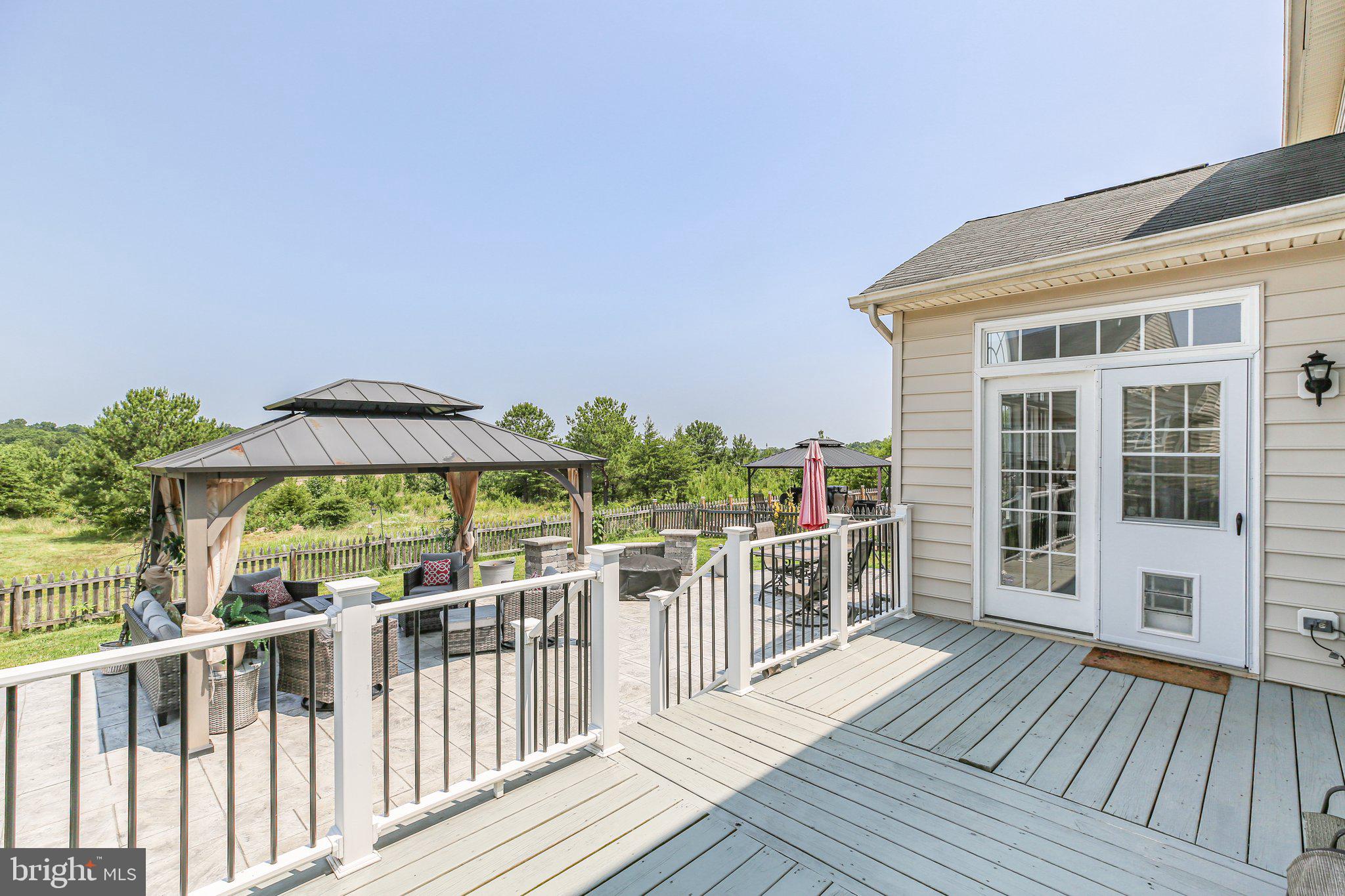 5233 Windbreak Drive Fredericksburg, VA 22407 - Photo 10 of 53 a view of a wooden deck with a yard