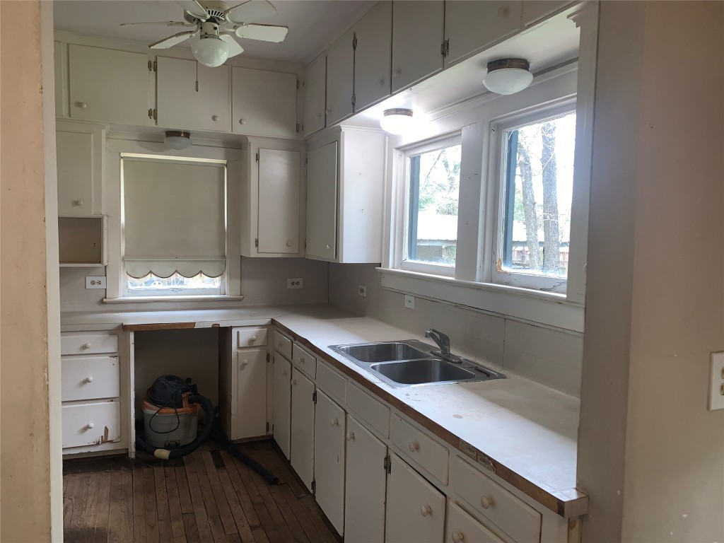22720 Hudson Road New Caney, TX 77357 - Photo 18 of 40 a kitchen with a sink and a window