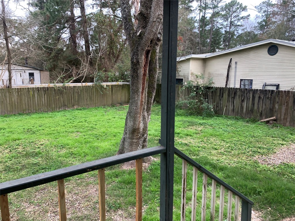 22720 Hudson Road New Caney, TX 77357 - Photo 20 of 40 a view of backyard with green space
