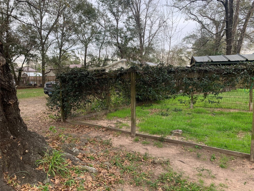 22720 Hudson Road New Caney, TX 77357 - Photo 22 of 40 a view of a park with large trees