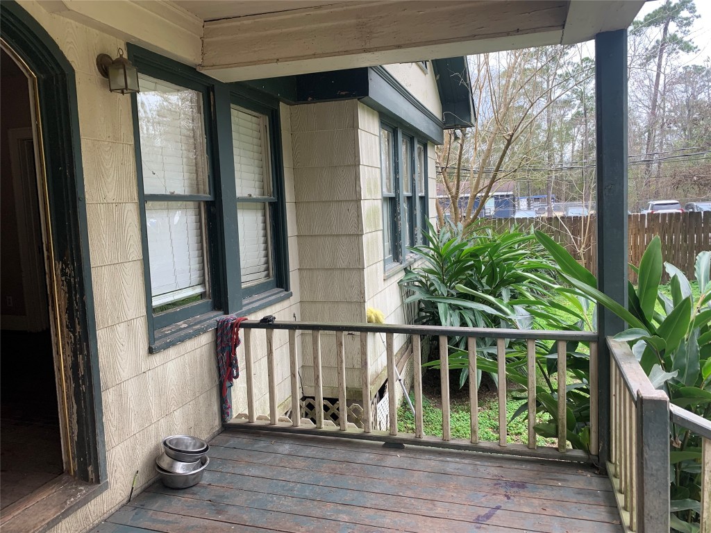 22720 Hudson Road New Caney, TX 77357 - Photo 34 of 40 a view of a house with a window and wooden floor