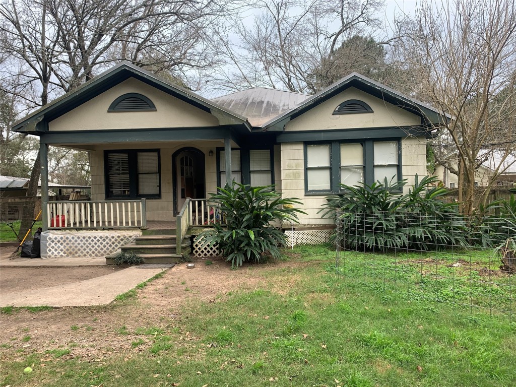 22720 Hudson Road New Caney, TX 77357 - Photo 5 of 40 a front view of a house with a yard