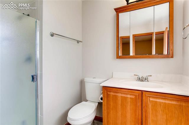 4672 Ranch Drive Colorado Springs, CO 80918 - Photo 12 of 27 Neat master bathroom.