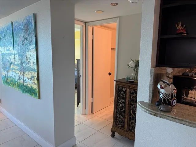 a kitchen with stainless steel appliances granite countertop a stove sink and cabinets
