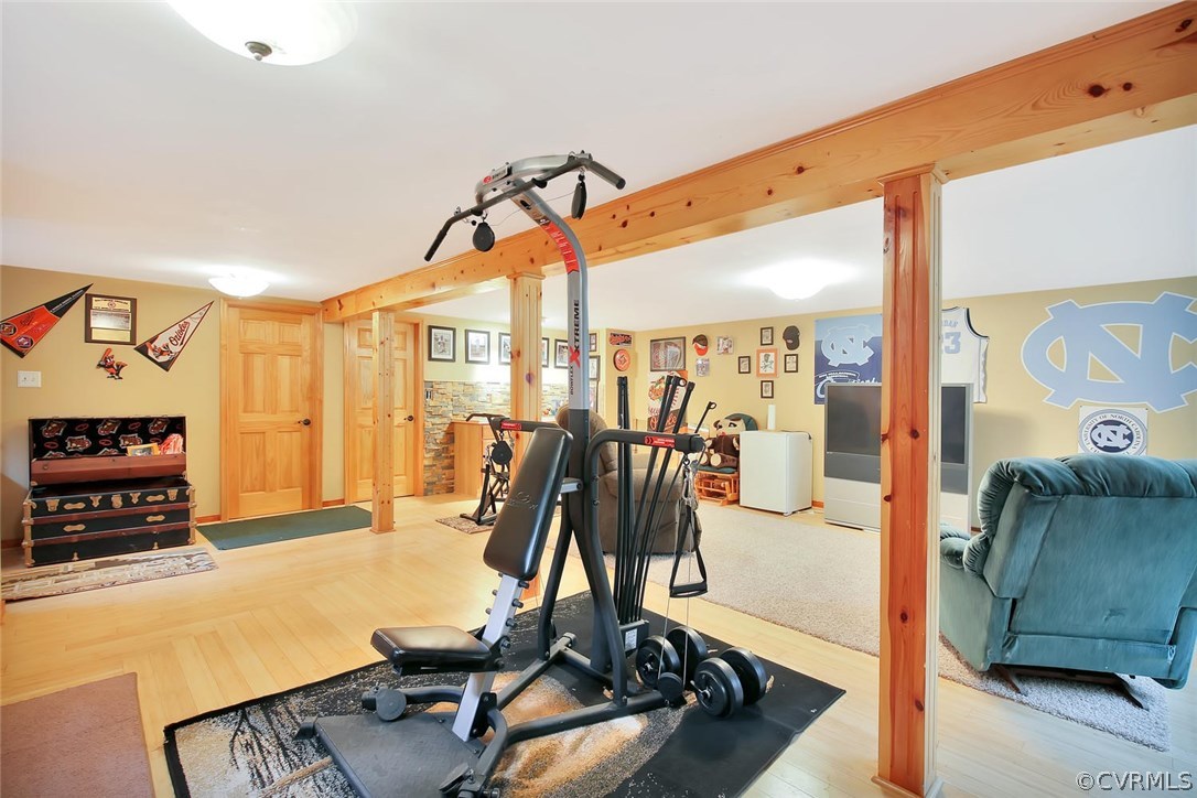 1601 Point Of Rocks Road Chester, VA 23836 - Photo 17 of 20 26 x 26 Rec Room in the basement with bamboo floor