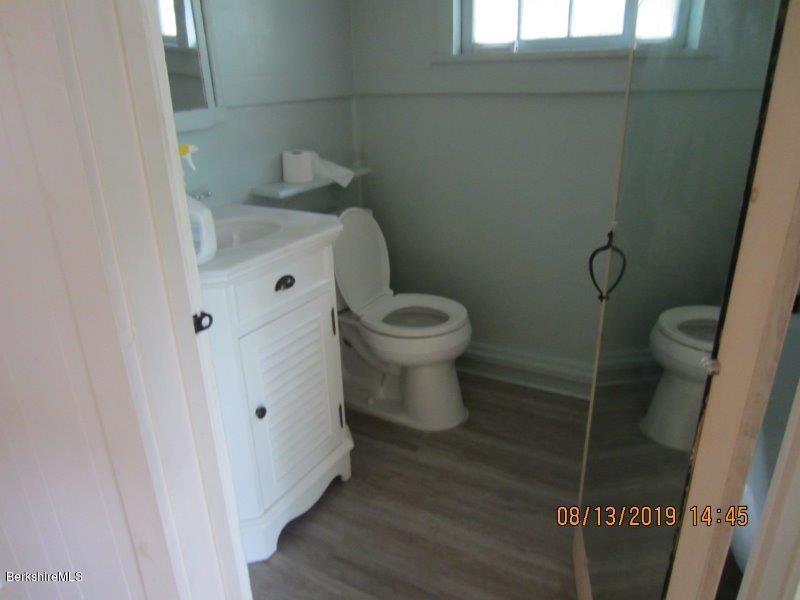 19 Glendale Middle Road Stockbridge, MA 01262 - Photo 3 of 5 a bathroom with a toilet and a shower