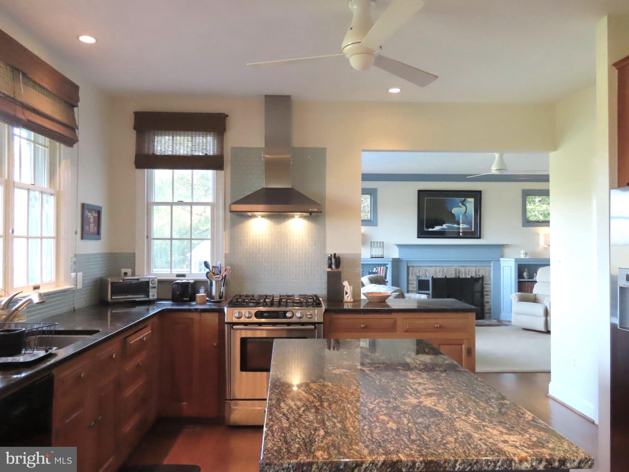 643 Richmond Road Amissville, VA 20106 - Photo 14 of 48 a kitchen with kitchen island granite countertop a stove and a sink