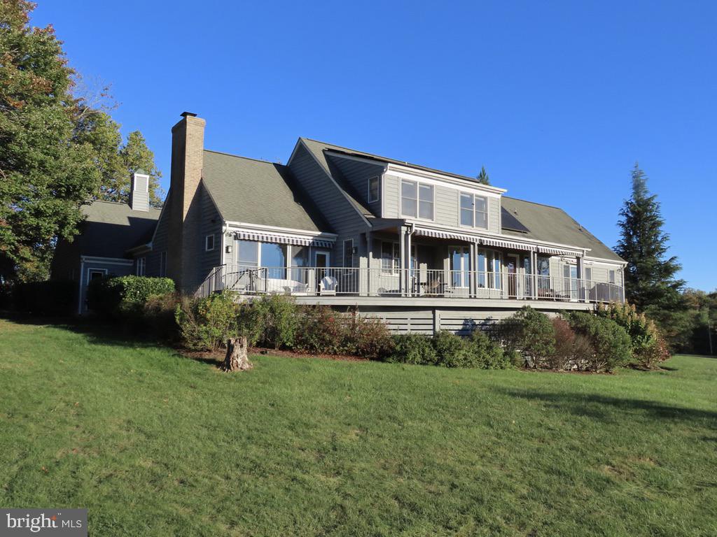 643 Richmond Road Amissville, VA 20106 - Photo 2 of 52 a front view of a house with a yard