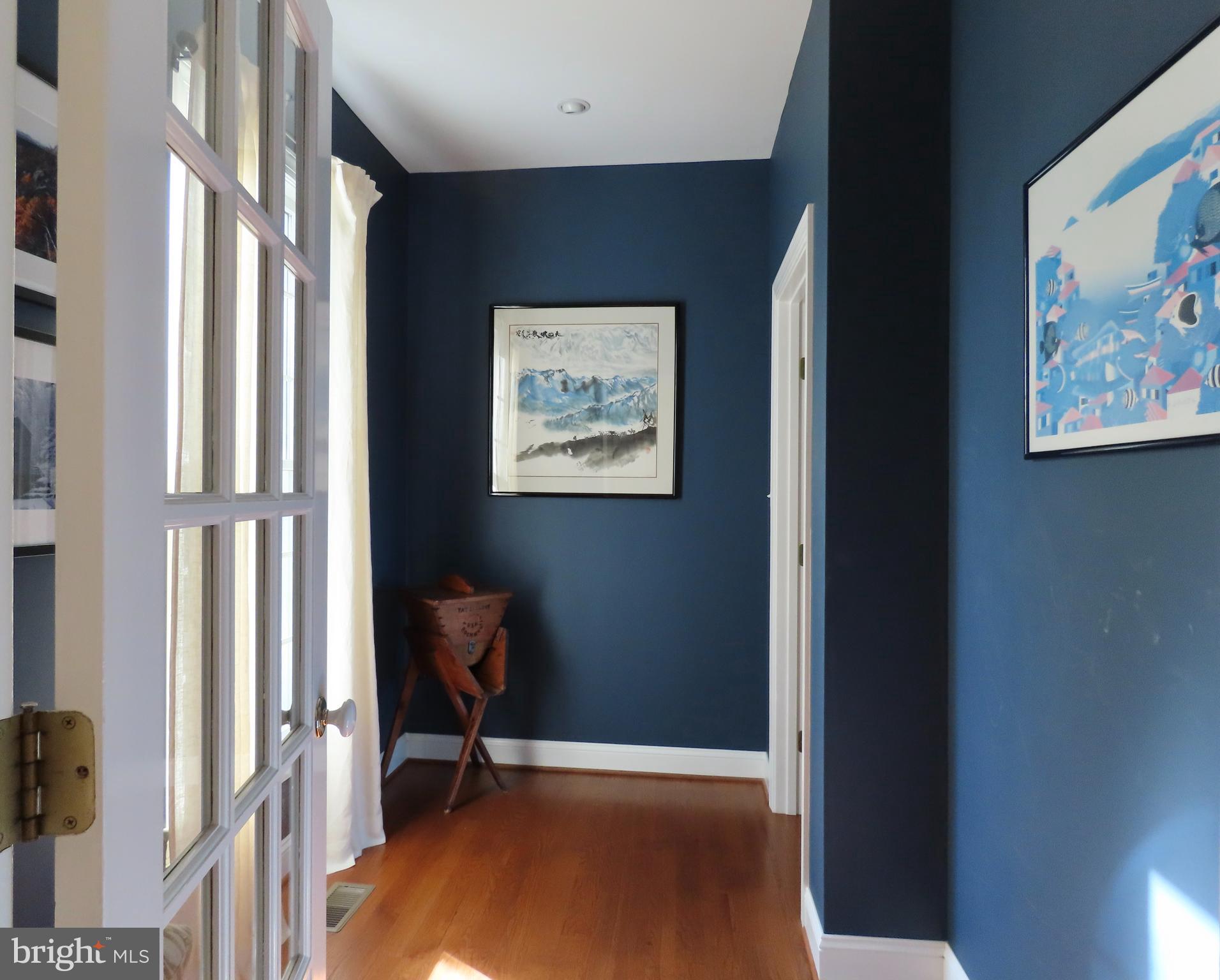 643 Richmond Road Amissville, VA 20106 - Photo 24 of 52 a view of a hallway with workspace and a window