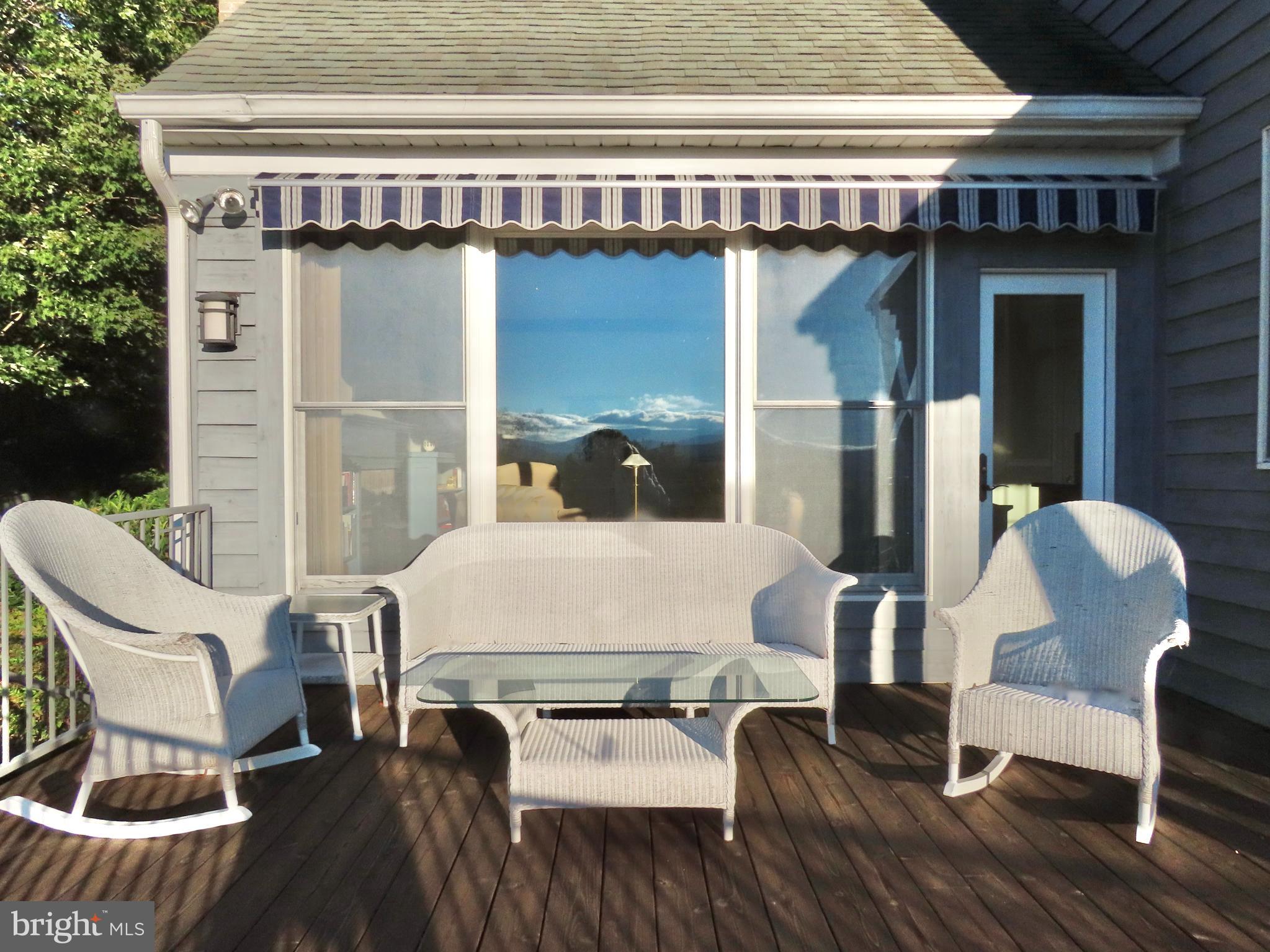 643 Richmond Road Amissville, VA 20106 - Photo 43 of 48 a balcony with table and chairs