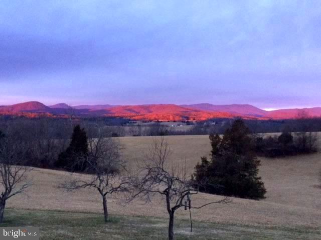 643 Richmond Road Amissville, VA 20106 - Photo 49 of 52 a view of a lake with a mountain