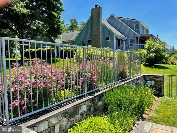a view of a garden with a flower garden
