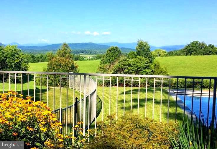 643 Richmond Road Amissville, VA 20106 - Photo 8 of 52 a view of a lake with a garden