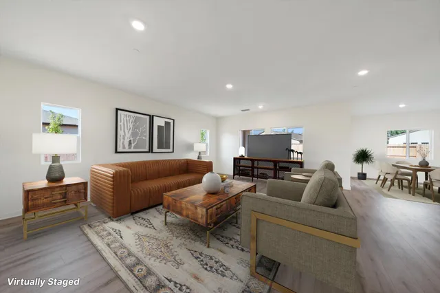 a view of an empty room and a window