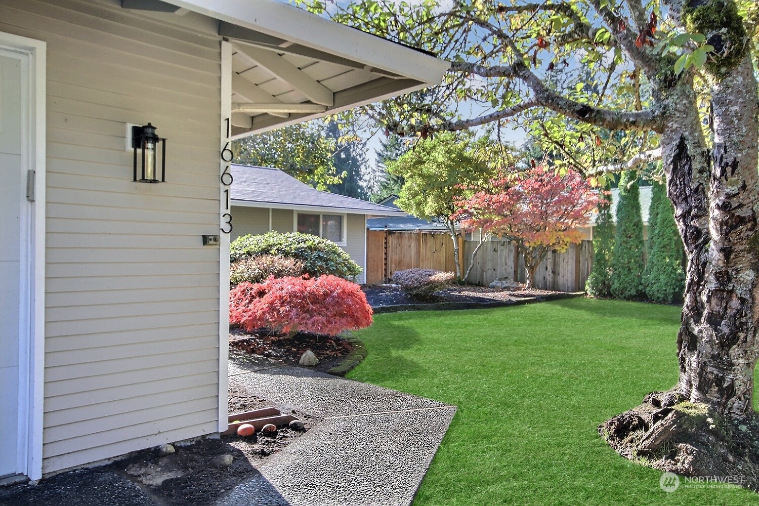 16613 Southeast 145th Street Renton, WA 98059 - Photo 2 of 40 a view of a house with backyard and garden