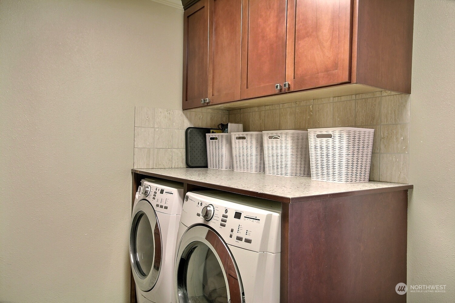 16613 Southeast 145th Street Renton, WA 98059 - Photo 21 of 40 a utility room with dryer and washer