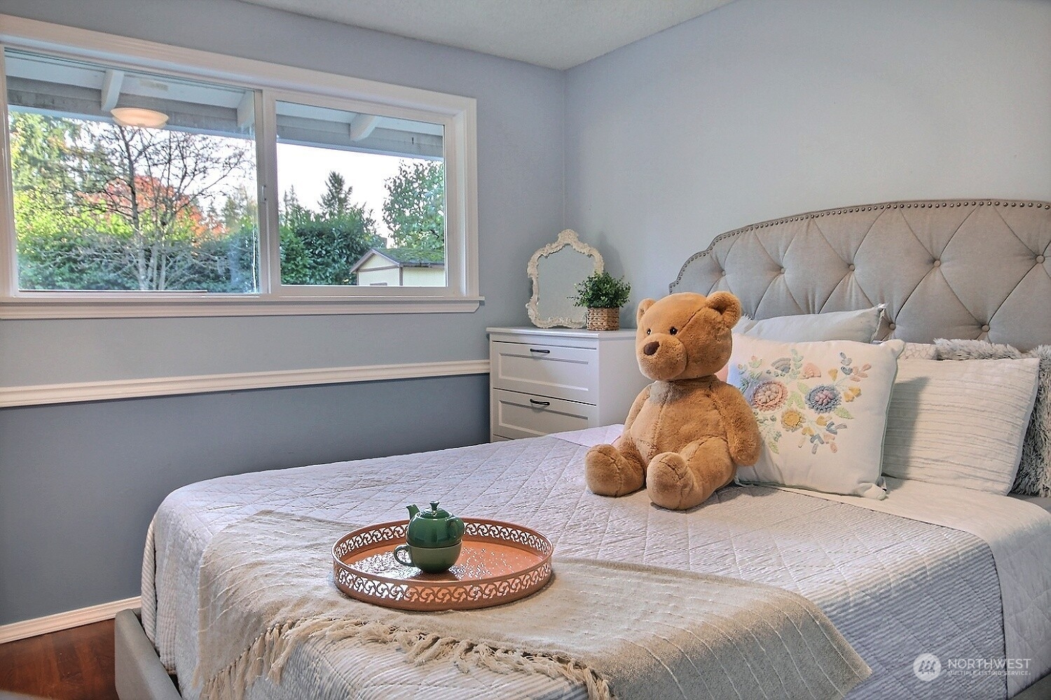16613 Southeast 145th Street Renton, WA 98059 - Photo 27 of 40 a bedroom with a bed and a window
