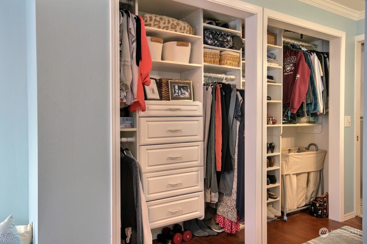 16613 Southeast 145th Street Renton, WA 98059 - Photo 32 of 40 a view of walk in closet with clothes and shoes