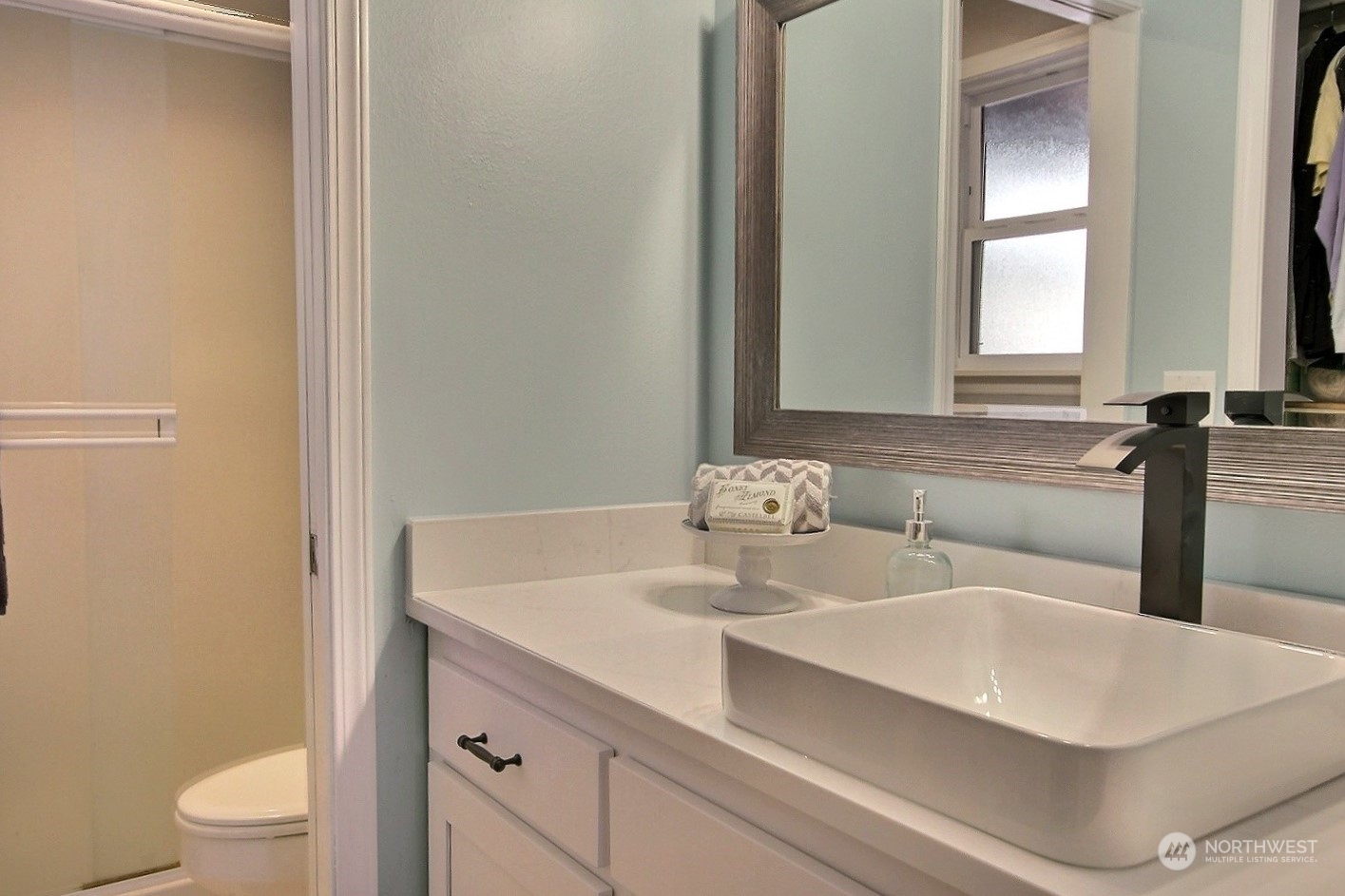 16613 Southeast 145th Street Renton, WA 98059 - Photo 34 of 40 a bathroom with a sink and a toilet