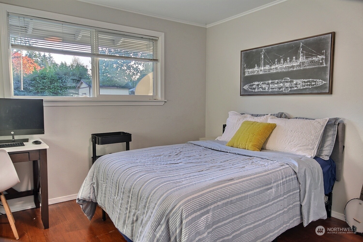 16613 Southeast 145th Street Renton, WA 98059 - Photo 35 of 40 a bedroom with bed and a window