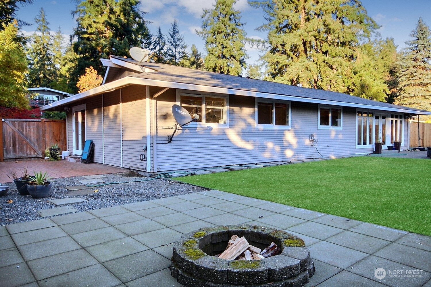 16613 Southeast 145th Street Renton, WA 98059 - Photo 39 of 40 a front view of a house with garden