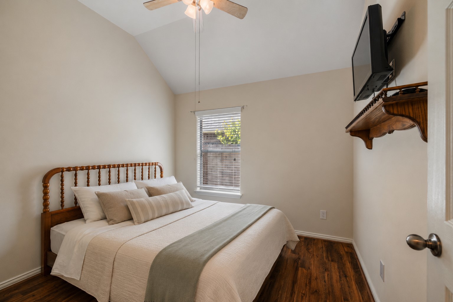 20014 Queens Oak Court Spring, TX 77379 - Photo 23 of 49 a bedroom with a bed and a flat tv screen on a dresser