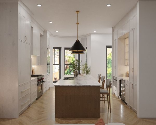 a dining hall with stainless steel appliances granite countertop couches a fireplace and large windows with wooden floor