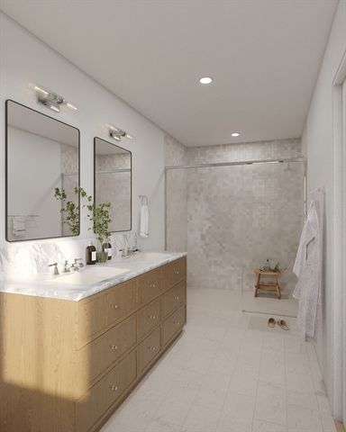 a bathroom with a double vanity sink mirror and double