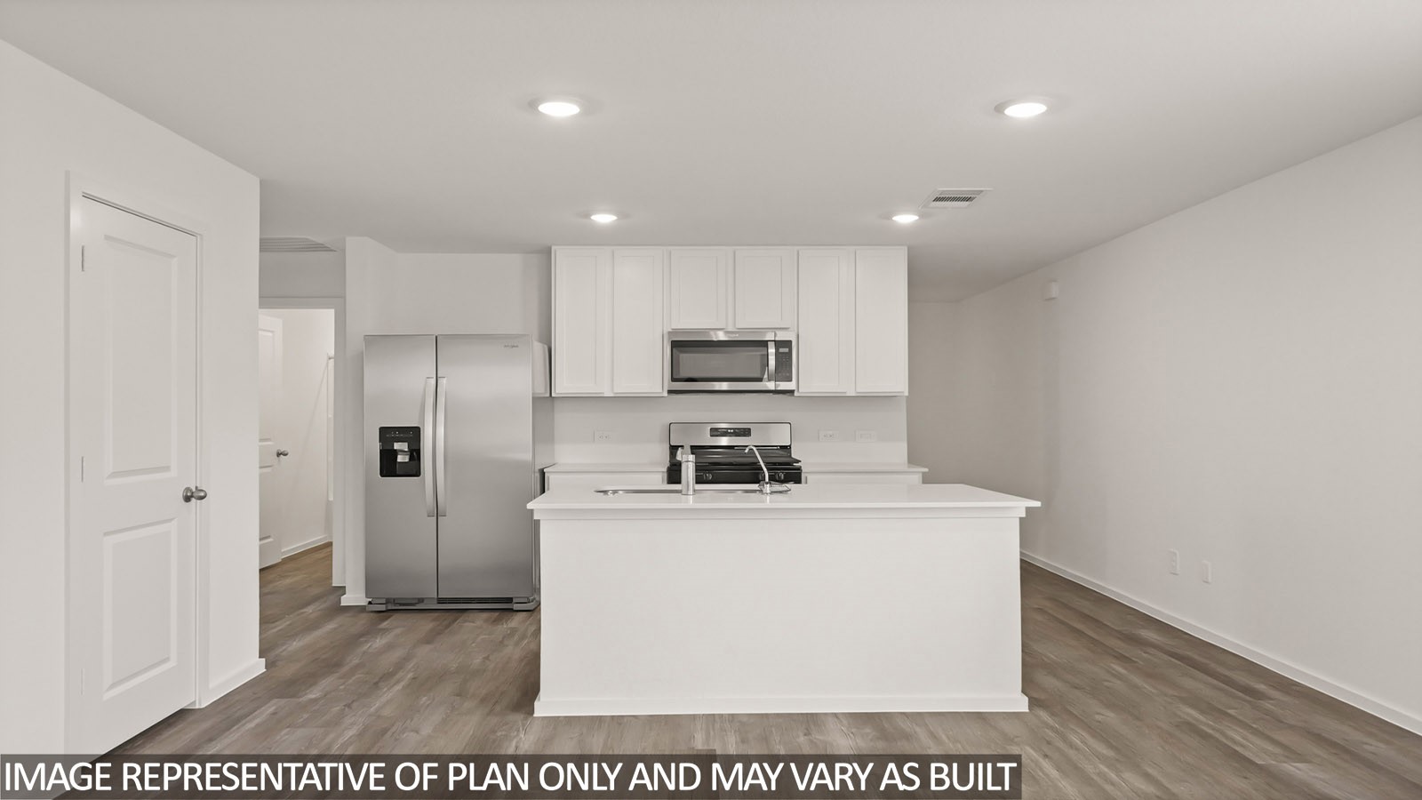 14609 Ivy Floral Way Splendora, TX 77372 - Photo 4 of 23 a utility room with stainless steel appliances wooden floor