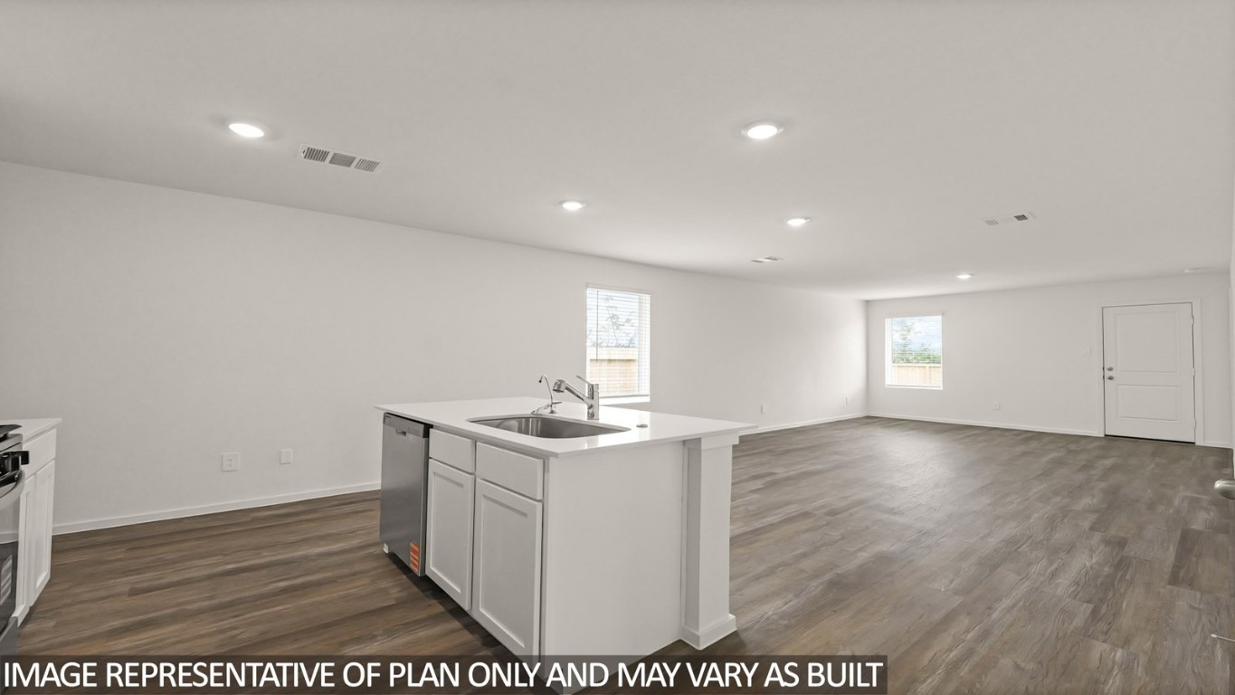 14609 Ivy Floral Way Splendora, TX 77372 - Photo 7 of 23 a view of empty room with wooden floor