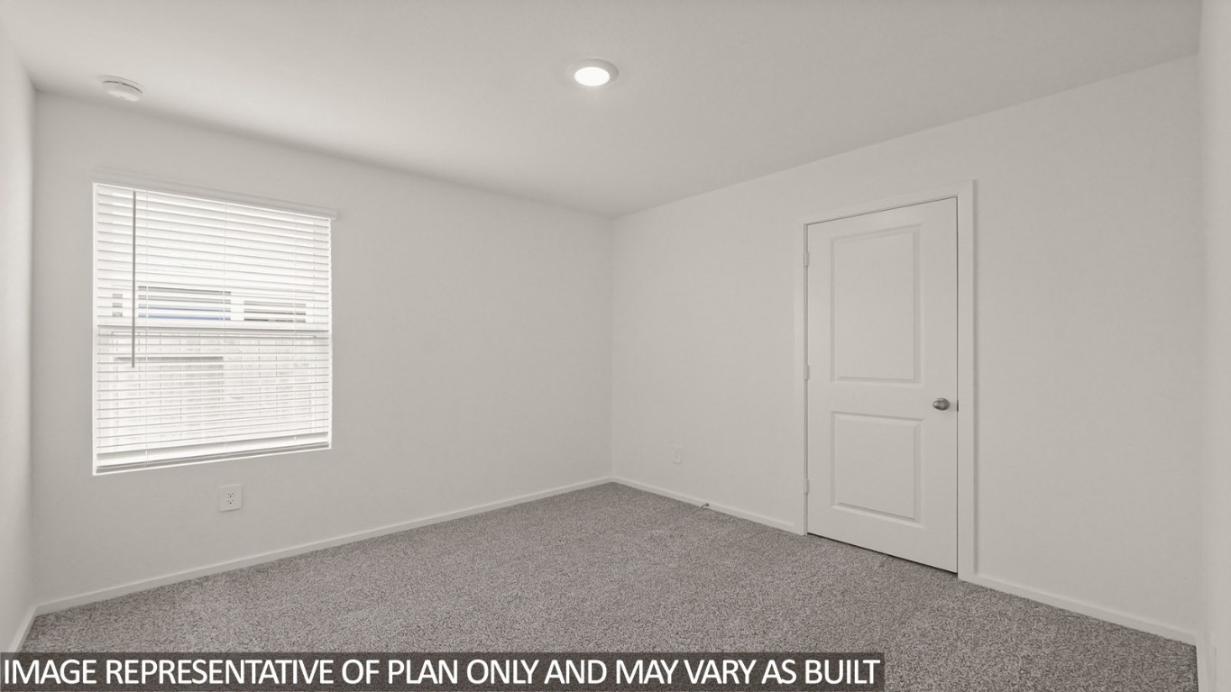 14609 Ivy Floral Way Splendora, TX 77372 - Photo 8 of 23 a view of an empty room with a window